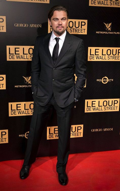 Actor Leonardo DiCaprio in a Giorgio Armani suit at the WOLF OF WALL STREET premiere 