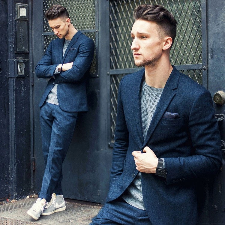 A creative pairing of sneakers and a suit is a bold decision for a creative job seeker 