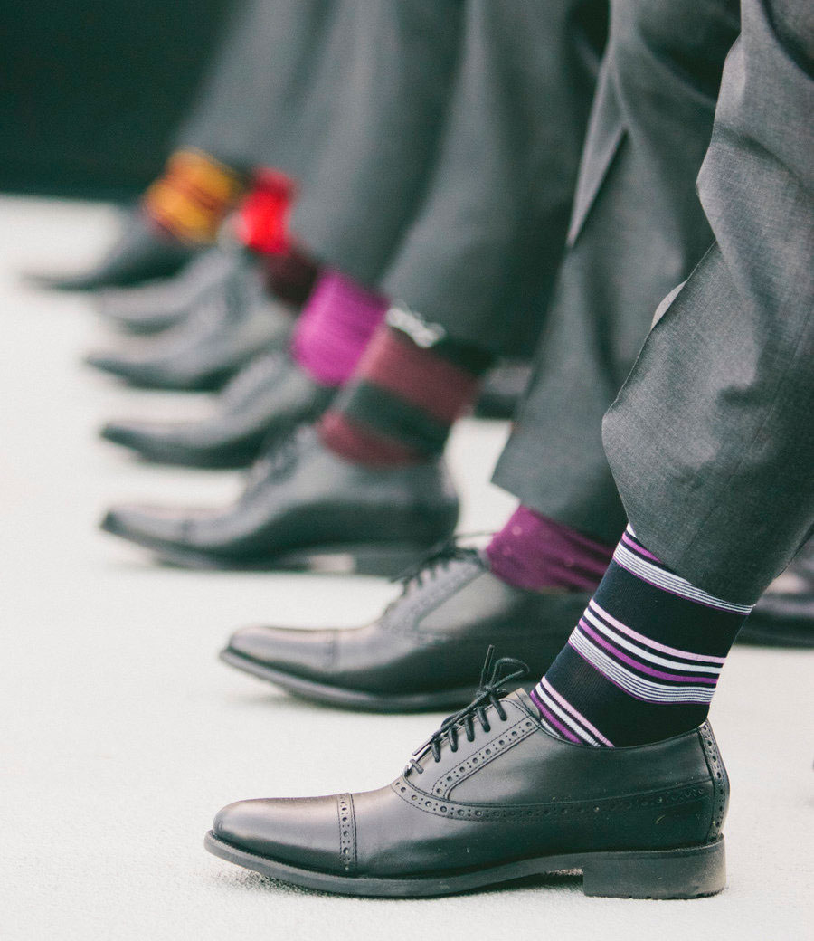 Colored socks go well with a classic gray suit 