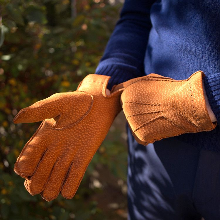 Hand-sewn gloves made of high-quality Italian leather in different colors will warm you on an autumn or winter day and will last for many years 