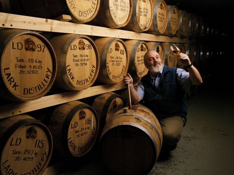 Barrels of whiskey in a warehouse 