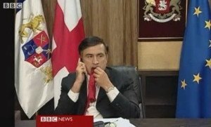 Saakashvili is eating his tie 
