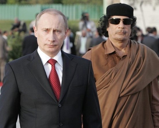 V.V.  Putin and Muammar Gaddafi 
