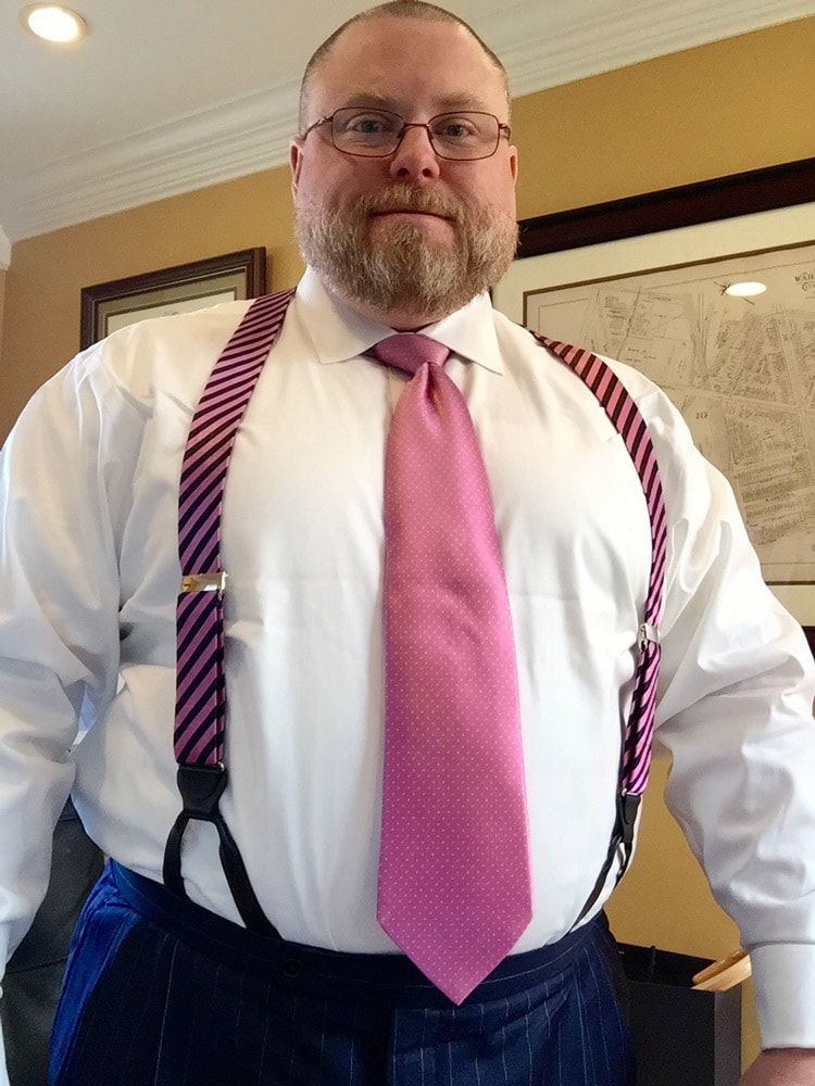Larger men are advised to wear suspenders, not a belt. 