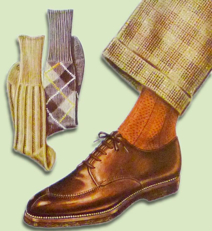Orange socks match brown checked shoes and trousers 