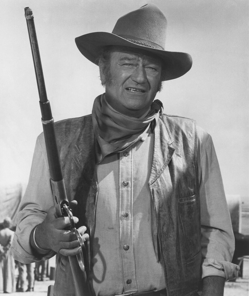 John Wayne in a leather vest 