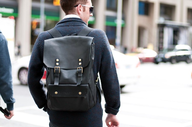 Urban backpack-satchel made of leather with a laconic design in a street men's bow 