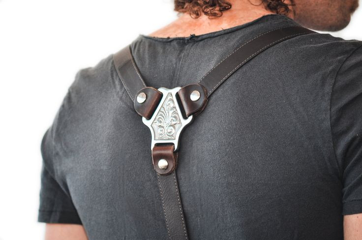 Leather suspenders with metal details look interesting 