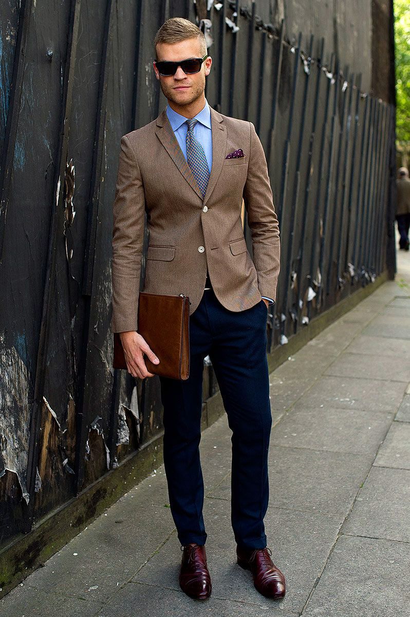 Incredibly stylish business casual option: a brown jacket, slightly tapered blue trousers, a shirt and shoes matched to the clothes 