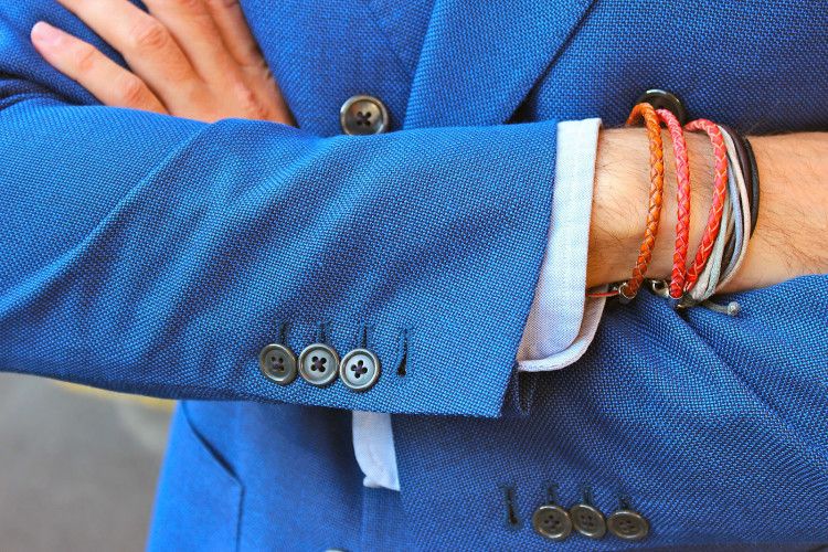 Multi-colored leather men's bracelets are organically combined with suits and outfits of bright colors 