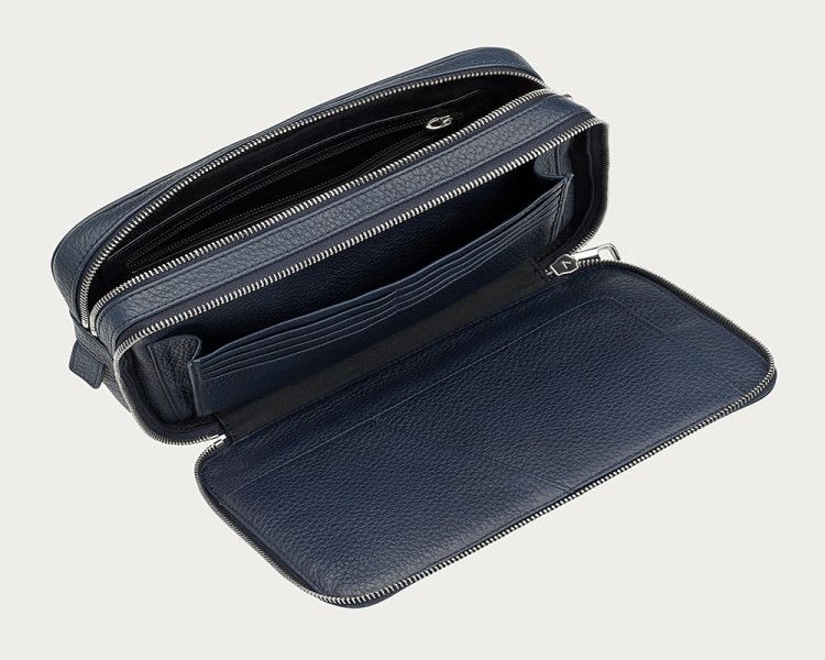 Multifunctional men's travel bag has many compartments and pockets for storing small items 