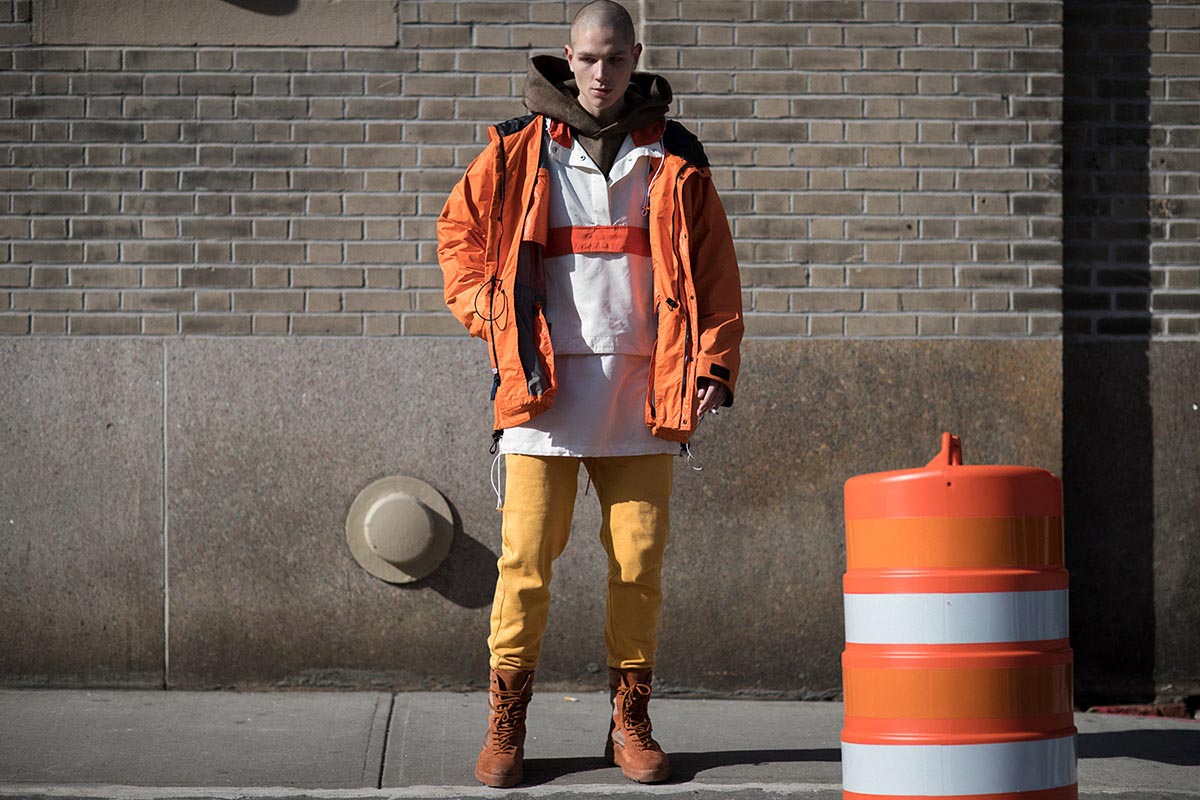 Orange jackets are subconsciously associated with street and workwear styles. 