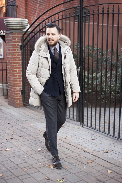A harmonious look for an office in a business casual style with a beige parka 