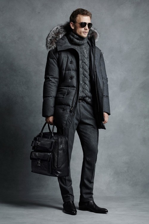 A James Bond-worthy discreet option for winter in a smart casual style featuring a gray parka, sweater and trousers 