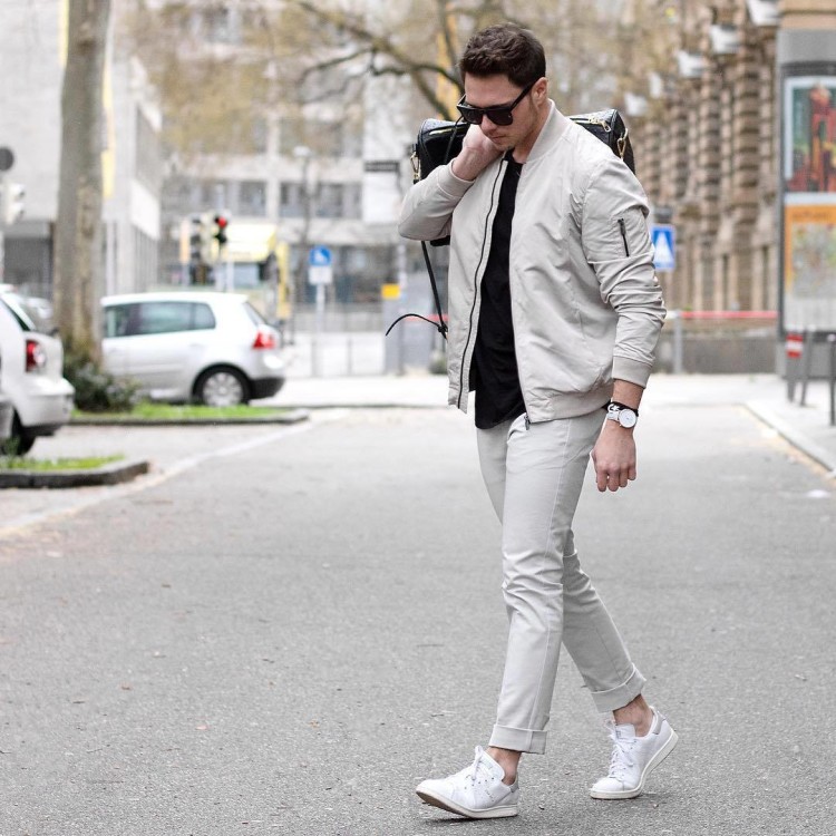 For cool weather, a bow with white sneakers can be complemented with a bomber jacket 